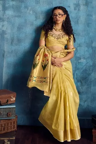 Yellow color luxurious zari tissue saree  classic ethnic collection