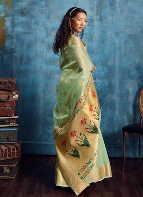Light green color luxurious zari tissue saree  classic ethnic collection 2