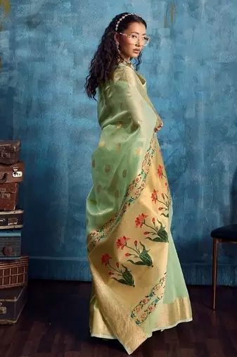 Light green color luxurious zari tissue saree  classic ethnic collection