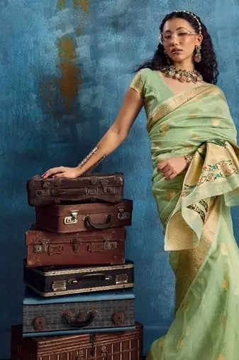 Light green color luxurious zari tissue saree  classic ethnic collection