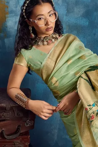 Light green color luxurious zari tissue saree  classic ethnic collection