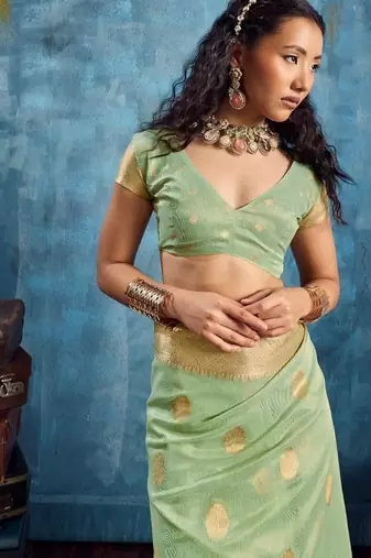 Light green color luxurious zari tissue saree  classic ethnic collection