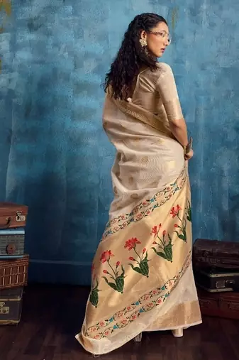 Cream luxurious zari tissue saree  classic ethnic collection