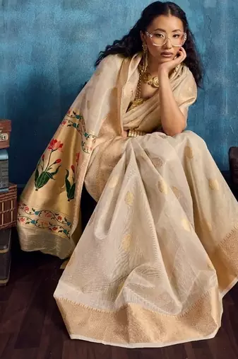 Cream luxurious zari tissue saree  classic ethnic collection