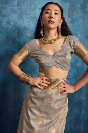 Grey color luxurious zari tissue saree  classic ethnic collection