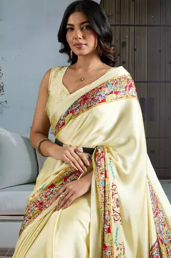 Cream color soft modal satin ajrakh print saree  timeless ethnic collection