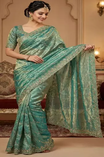 Sea green pure space silk saree with beautiful sequence embroidery work with cut work border