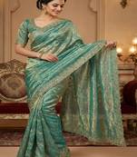 Sea green pure space silk saree with beautiful sequence embroidery work with cut work border