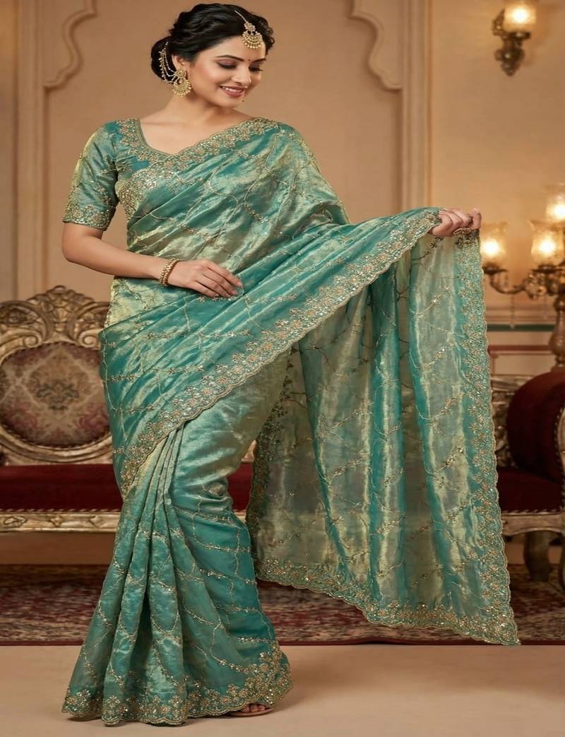 Sea green pure space silk saree with beautiful sequence embroidery work with cut work border