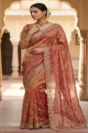 Peach pure space silk saree with beautiful sequence embroidery work with cut work border