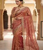 Peach pure space silk saree with beautiful sequence embroidery work with cut work border