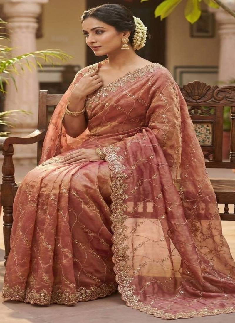 Peach pure space silk saree with beautiful sequence embroidery work with cut work border
