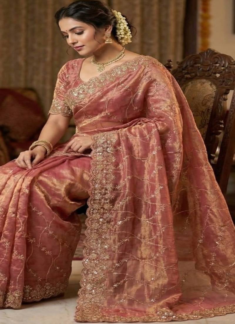 Peach pure space silk saree with beautiful sequence embroidery work with cut work border