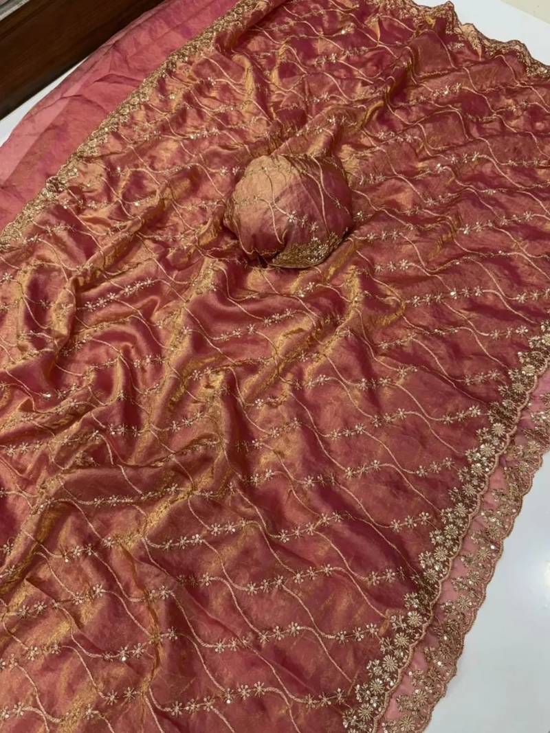 Peach pure space silk saree with beautiful sequence embroidery work with cut work border