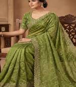 Parrot green pure space silk saree with beautiful sequence embroidery work with cut work border