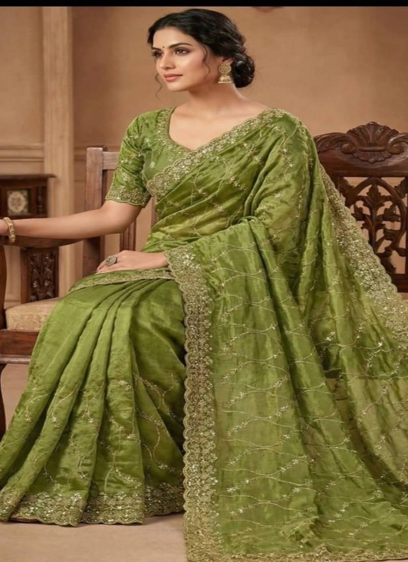 Parrot green pure space silk saree with beautiful sequence embroidery work with cut work border