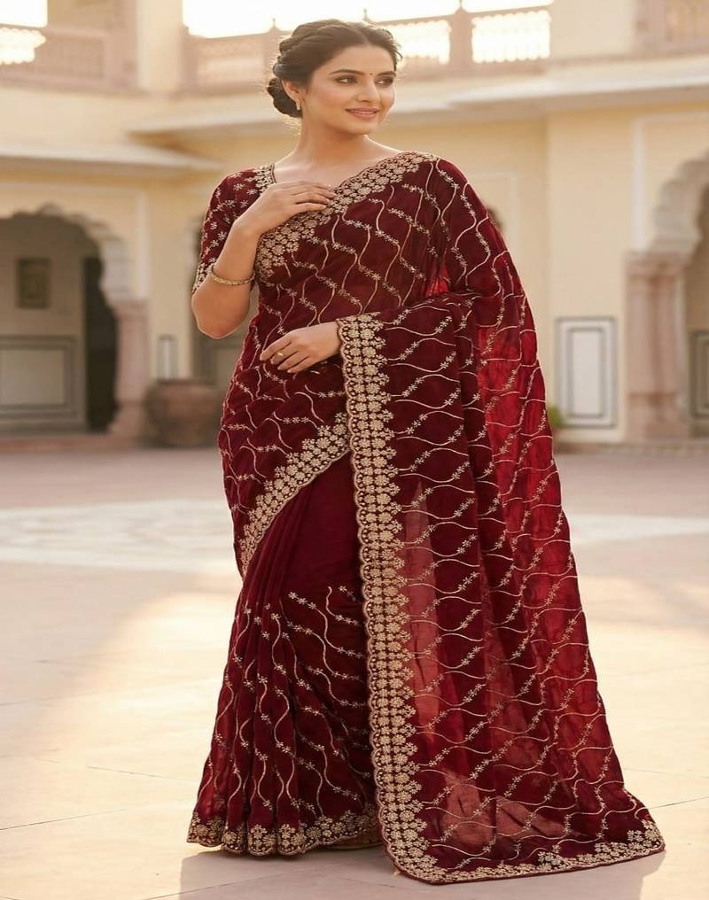 Maroon pure space silk saree with beautiful sequence embroidery work with cut work border