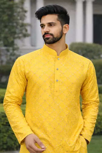 Yellow color silver and mate sequence embroidery work silk kurta payjama set
