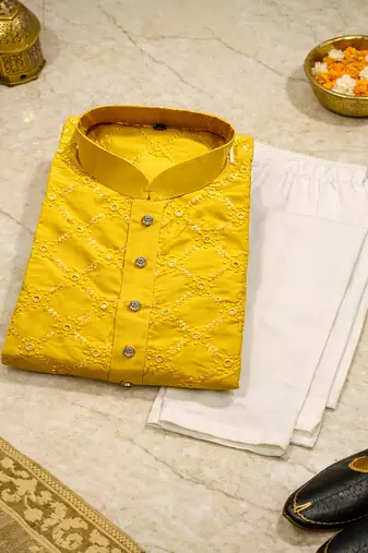 Yellow color silver and mate sequence embroidery work silk kurta payjama set