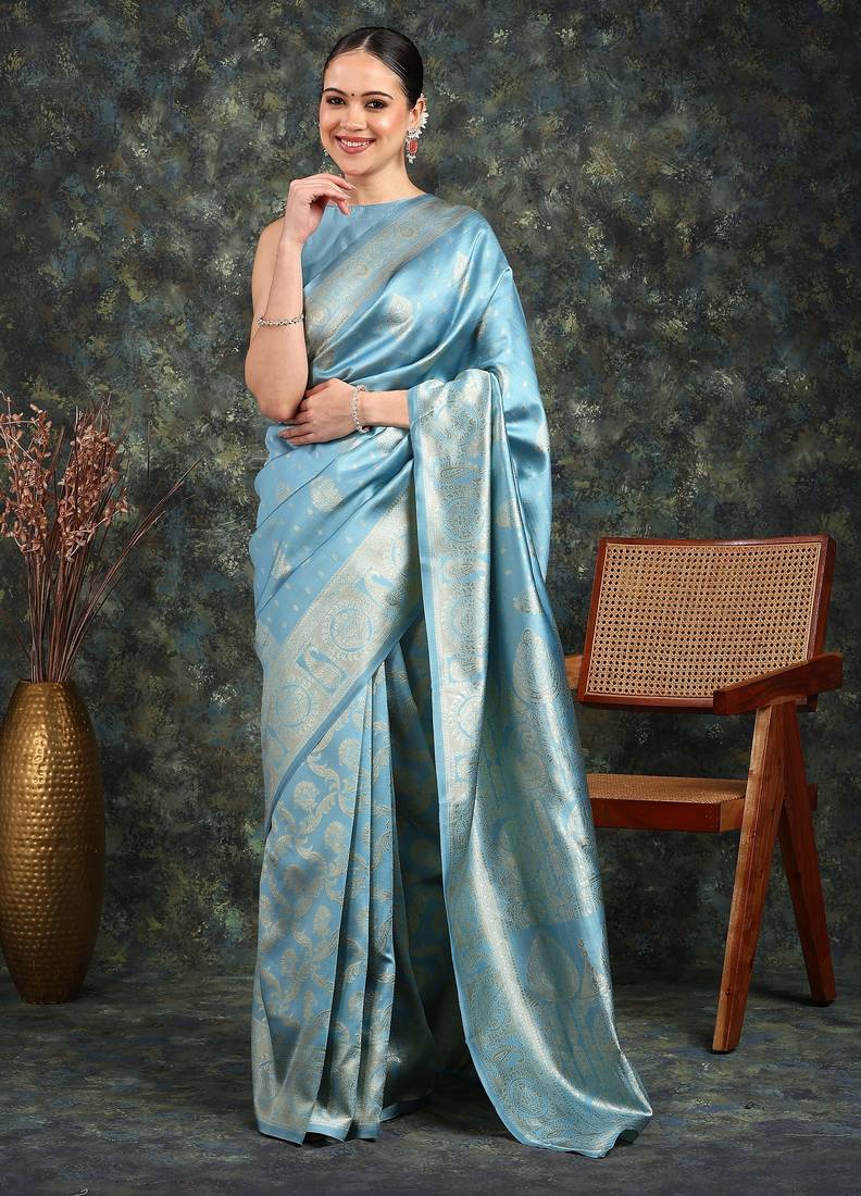 Subham turquoise silk blend saree with woven design & unstitched blouse piece for women