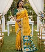 Yellow color  Banarasi zari and Meenakari ikkat design Work  Silk saree
