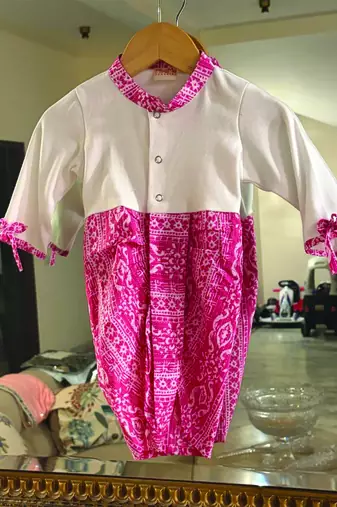 Pink printed cotton romper body suit