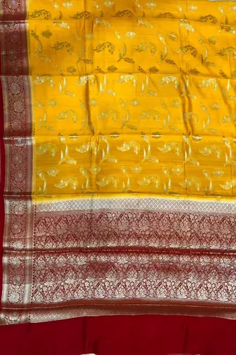 Banarasi puresilk chiniya saree in mustard colour with  floral zari work