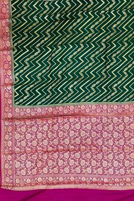 Banarasi puresilk munga saree in bottle green colour with floral zari work 3