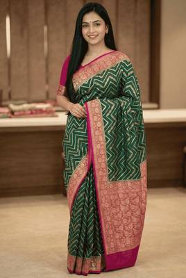 Banarasi puresilk munga saree in bottle green colour with floral zari work 1