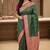 Banarasi puresilk munga saree in bottle green colour with floral zari work