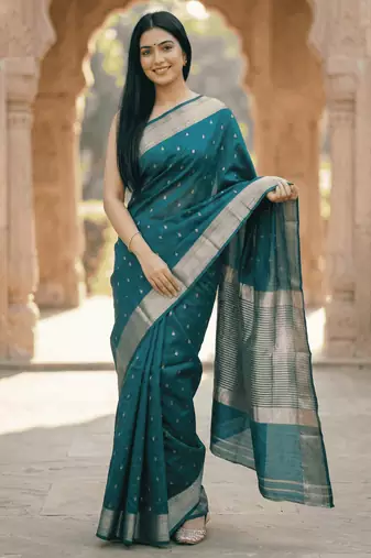 Banarasi puresilk chiniya saree in bottle green colour with zari booti work