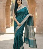 Banarasi puresilk chiniya saree in bottle green colour with zari booti work