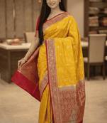 Banarasi puresilk chiniya saree in mustard colour with  floral zari work