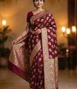 Banarasi puresilk khaddi georgette saree in maroon colour with floral zari rangkart work