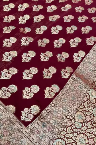 khaddi georgette saree in maroon colour with floral zari rangkart work