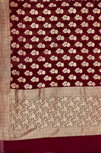 khaddi georgette saree in maroon colour with floral zari rangkart work