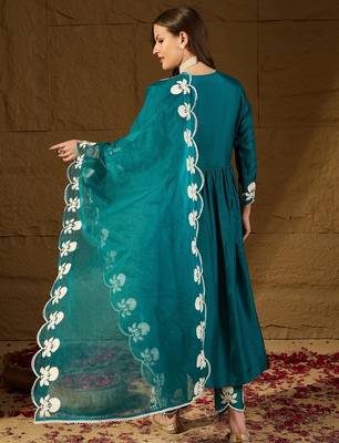 Women teal silk blend solid embroidered a-line kurta trouser with dupatta 4