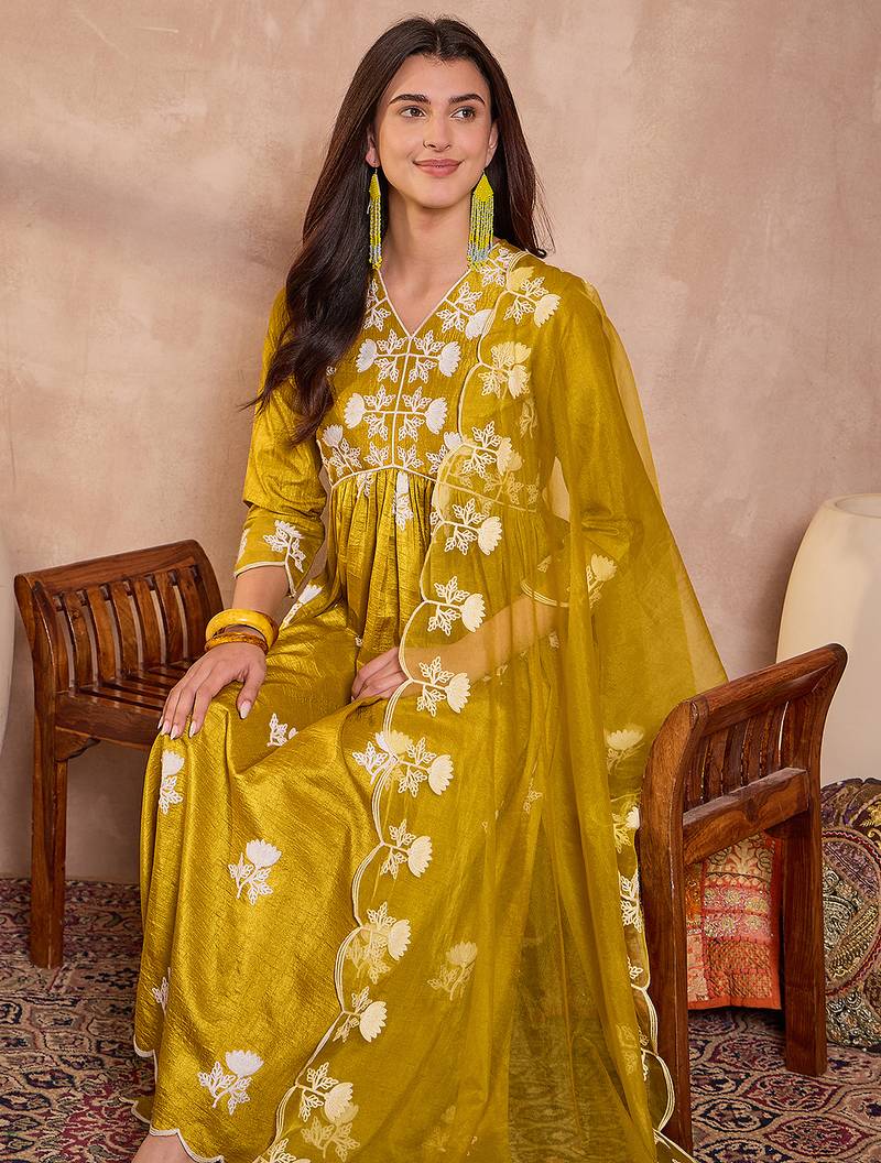 Women mustard silk blend solid embroidered a-line kurta trouser with dupatta