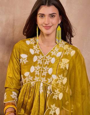 Women mustard silk blend solid embroidered a-line kurta trouser with dupatta 2
