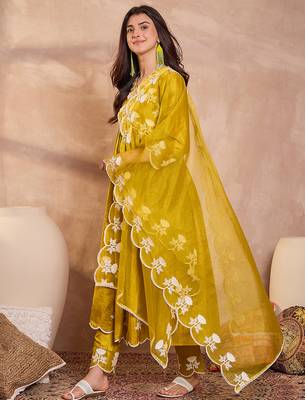 Women mustard silk blend solid embroidered a-line kurta trouser with dupatta 3