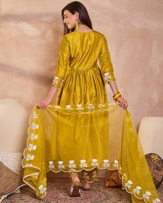 Women mustard silk blend solid embroidered a-line kurta trouser with dupatta 4