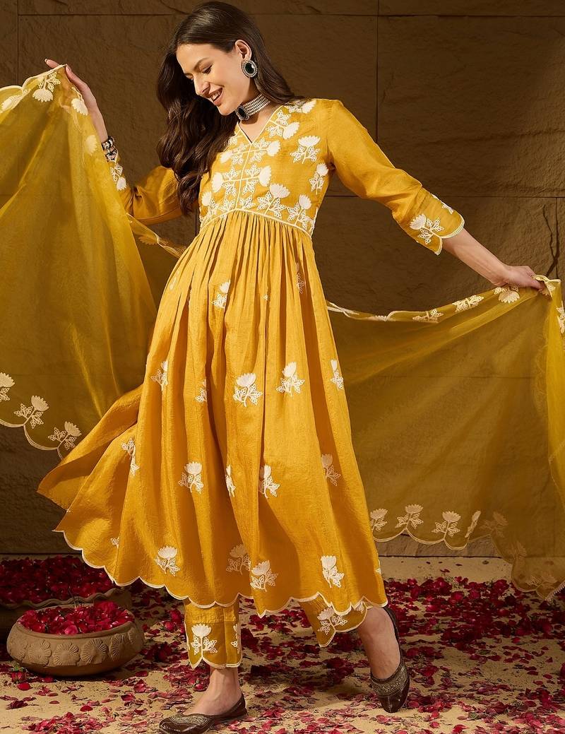 Women yellow silk blend solid embroidered a-line kurta trouser with dupatta