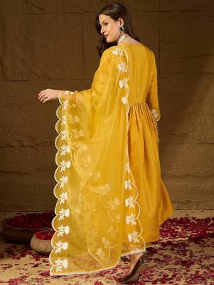 Women yellow silk blend solid embroidered a-line kurta trouser with dupatta 4