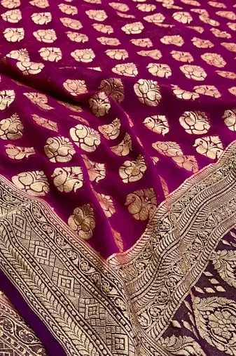 Banarasi puresilk khaddi georgette saree in rani pink colour with floral zari work