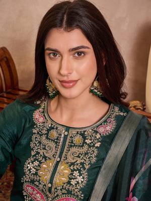 Women green silk blend solid embroidered straight kurta trouser with dupatta 3