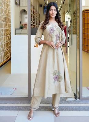 Floral embroidered cotton round neck beige kurta & trouser set 1