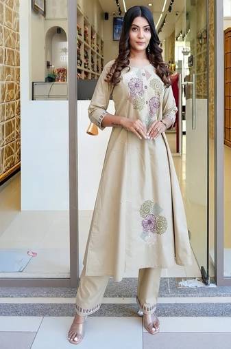 Floral embroidered pure cotton round neck beige kurta & trouser set