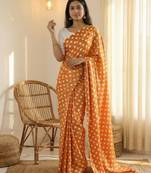 Orange & white color polka dots printed japan satin saree with unstitched blouse