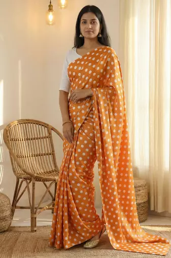 Orange & white color polka dots printed japan satin saree with unstitched blouse
