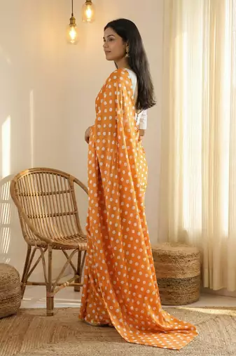 Orange & white color polka dots printed japan satin saree with unstitched blouse